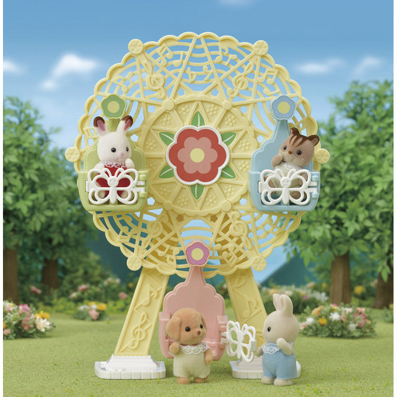 La grande roue et Milo le bébé Caniche