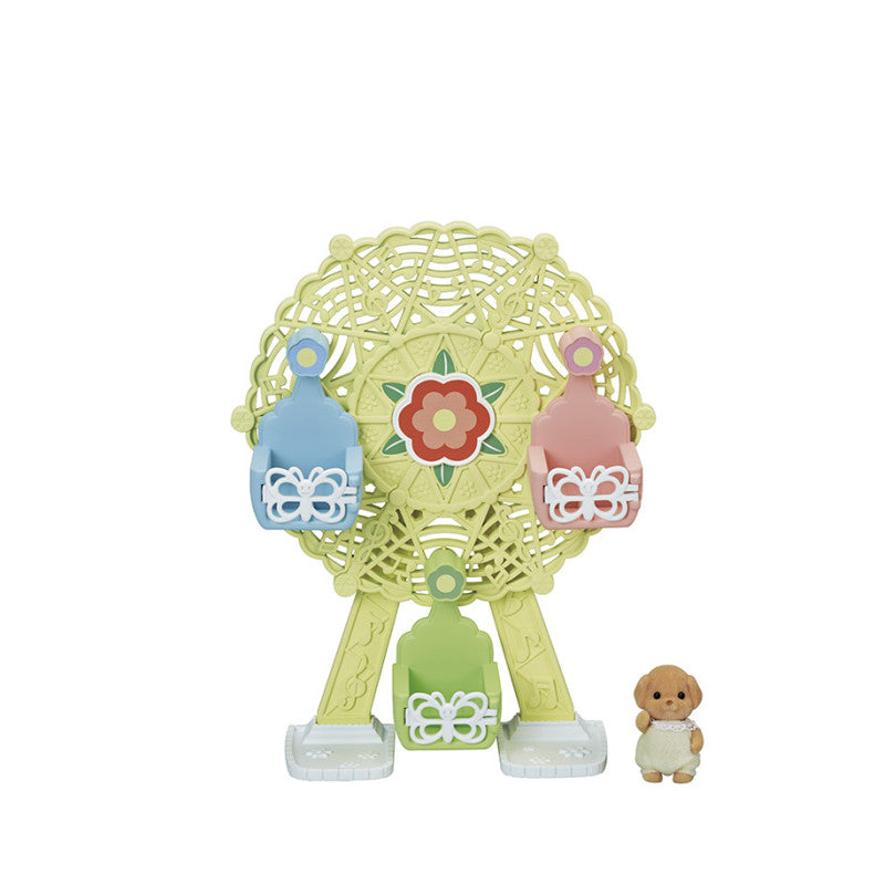 La grande roue et Milo le bébé Caniche