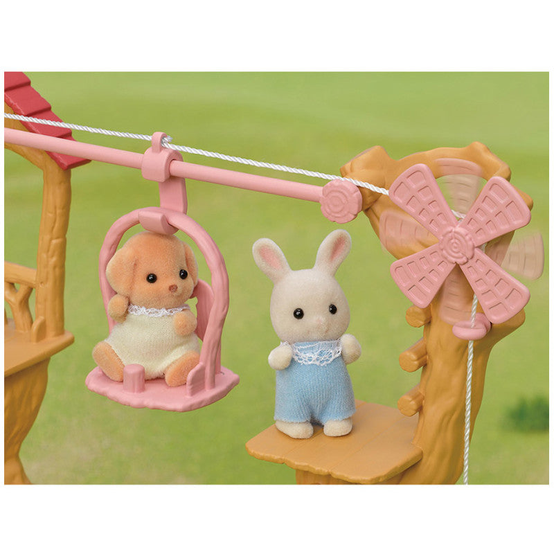 La tyrolienne et le bébé Lapin Crème
