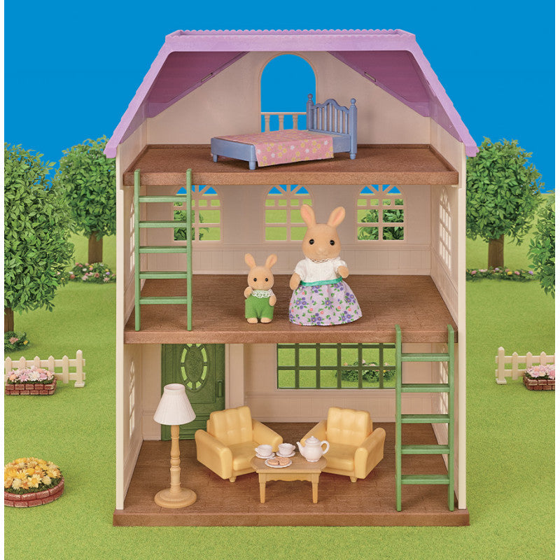 La maison à deux étages de la famille Lapin Caramel