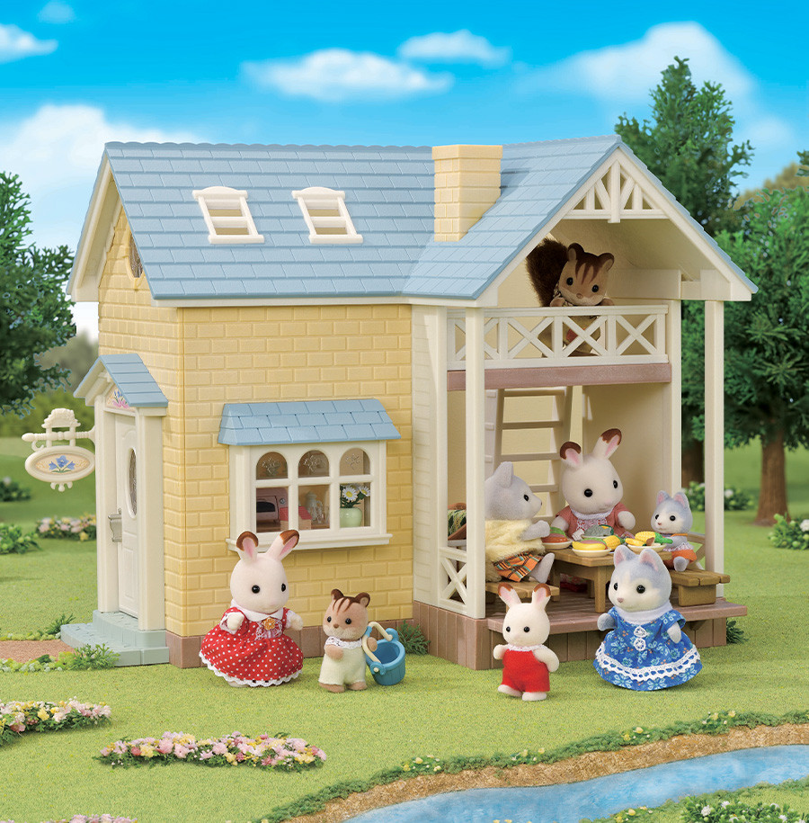 La maison au toit bleu et sa terrasse - Maison de poupée et accessoires et  accessoires Sylvanian Families - Achat en ligne