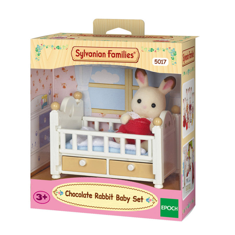 Le bébé Lapin Chocolat et le lit