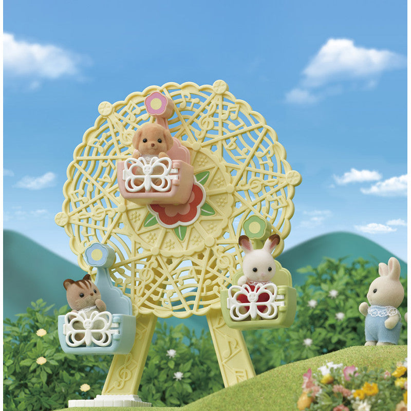 La grande roue et Milo le bébé Caniche