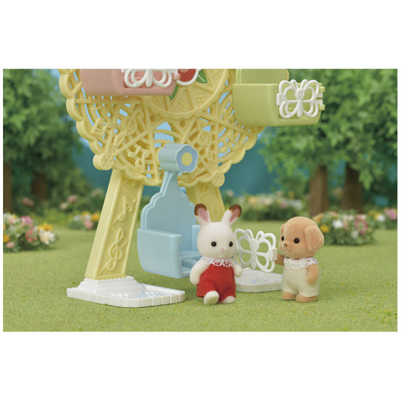 La grande roue et Milo le bébé Caniche