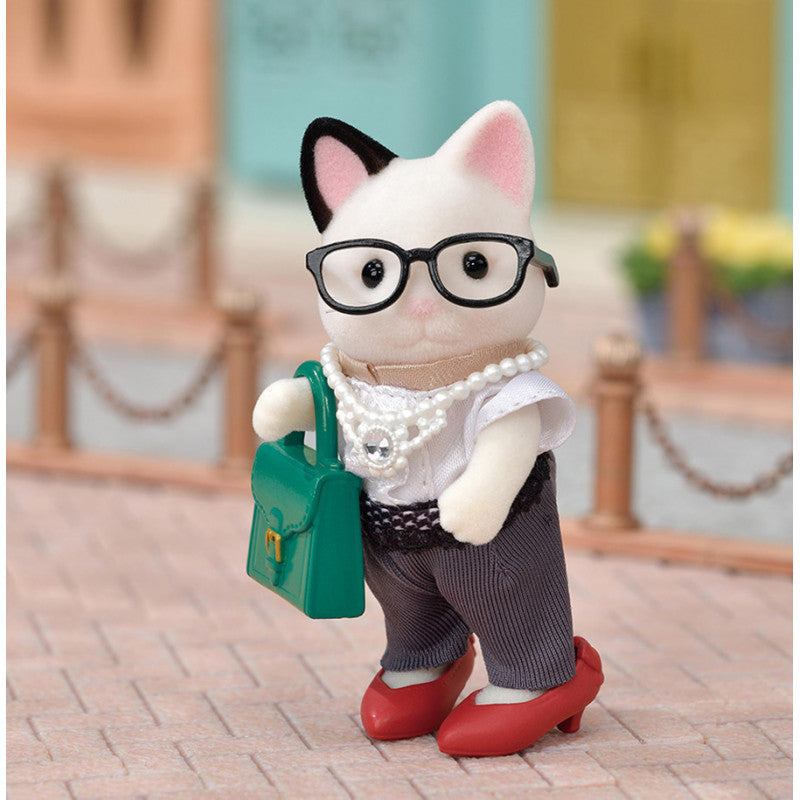 La valisette de mode et la grande sœur Chat Bicolore