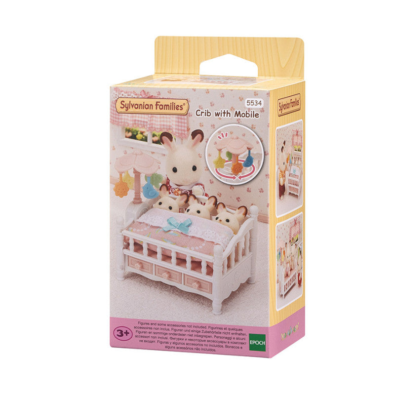 Le lit de bébé et mobile